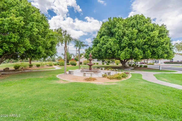 a view of a swimming pool with a patio