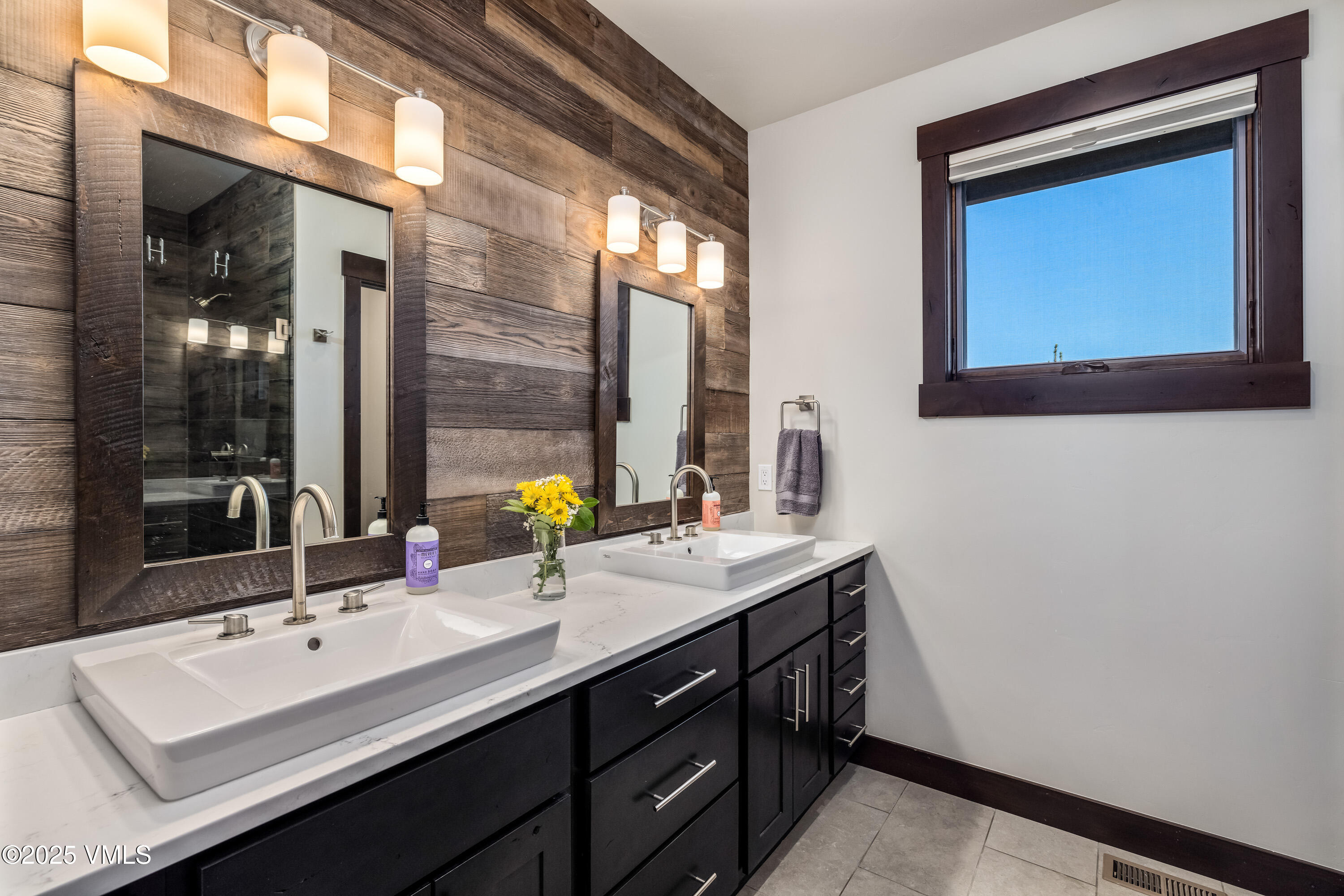 140 Hunters View Lane Eagle, CO 81631 - Photo 16 of 38 a bathroom with a sink double vanity and a mirror
