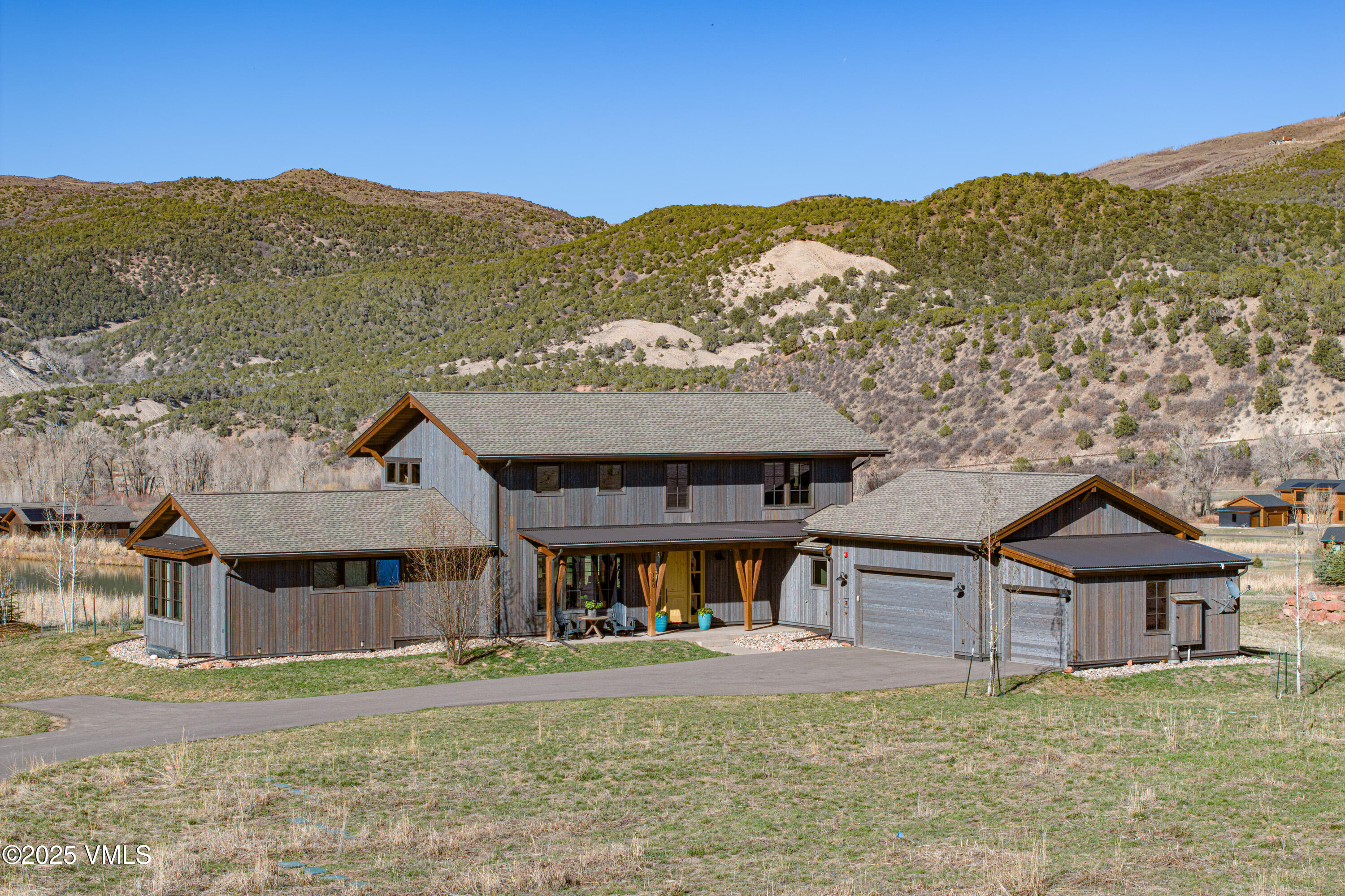 140 Hunters View Lane Eagle, CO 81631 - Photo 32 of 38 front view of a house with a yard
