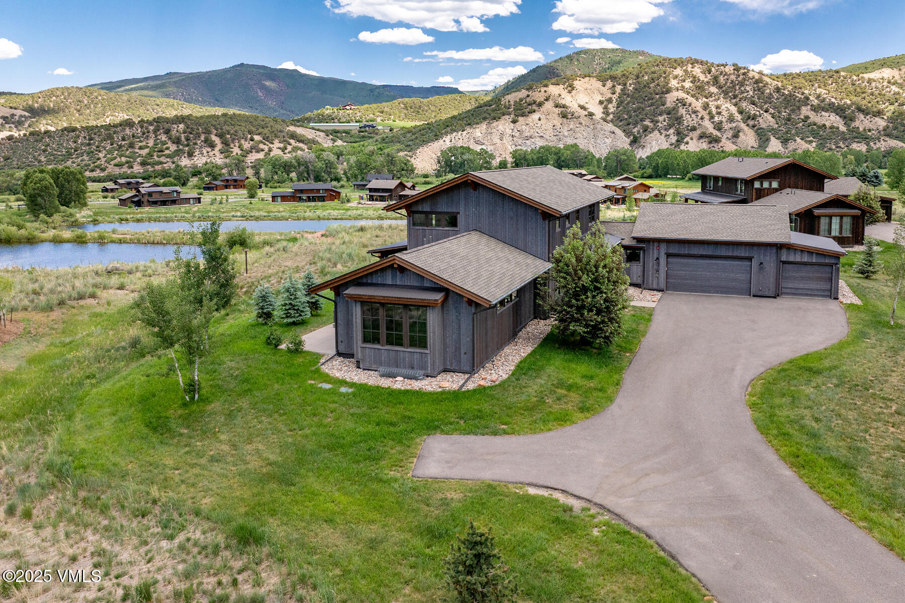 140 Hunters View Lane Eagle, CO 81631 - Photo 35 of 38 an aerial view of residential houses with outdoor space and river
