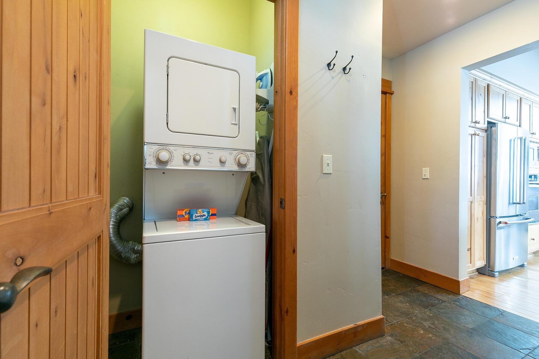 12202 Lookout Loop, Unit F2009 Truckee, CA 96161 - Photo 26 of 28 a utility room with dryer and washer