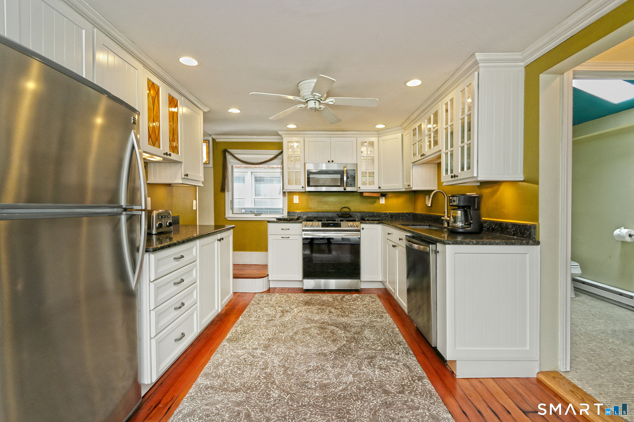 13 Billows Road Old Saybrook, CT 06475 - Photo 11 of 34 Kitchen with stainless steel appliances and granite countertops