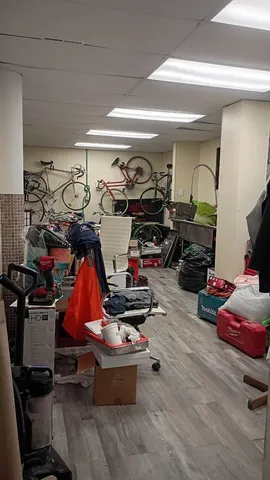 a media room with lots of chairs and a projector