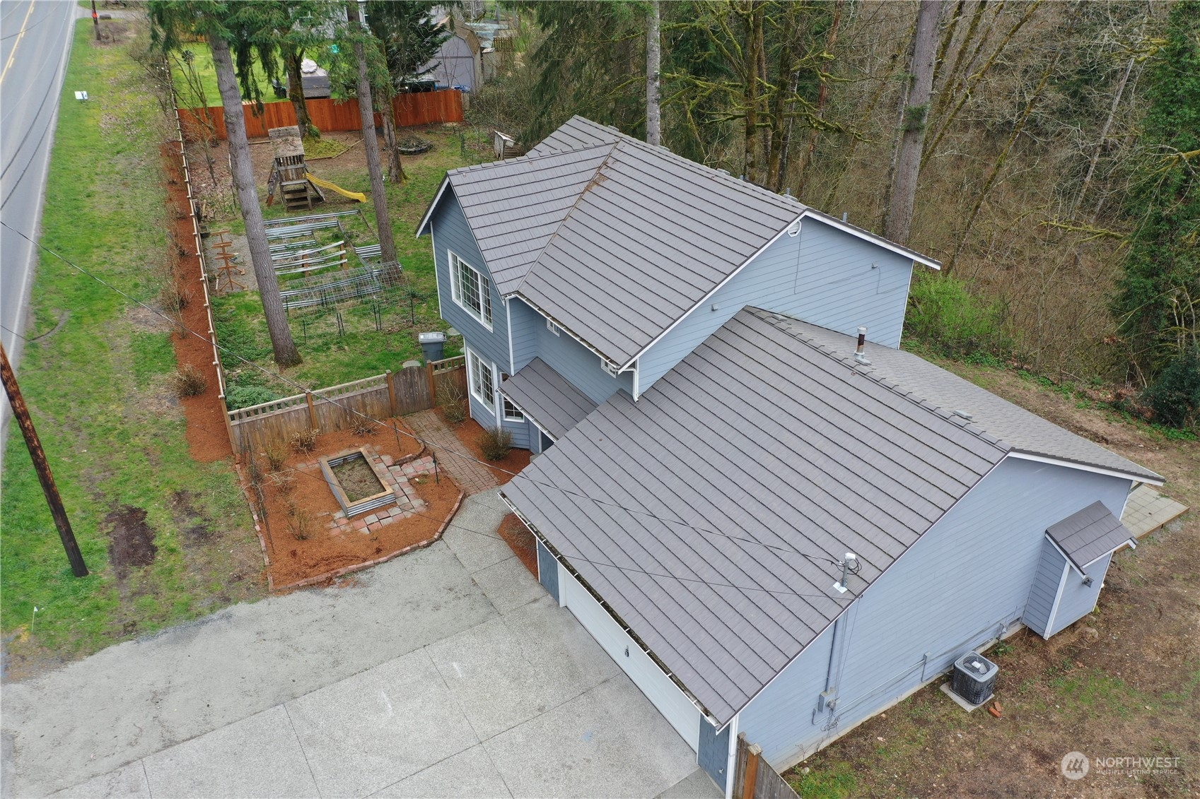 24833 Florence Acres Road Monroe, WA 98272 - Photo 16 of 21 a view of a house with a yard