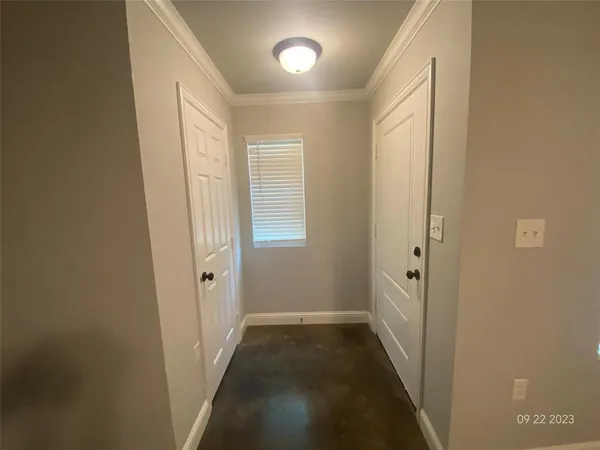 a view of a kitchen with a sink and a stove top oven