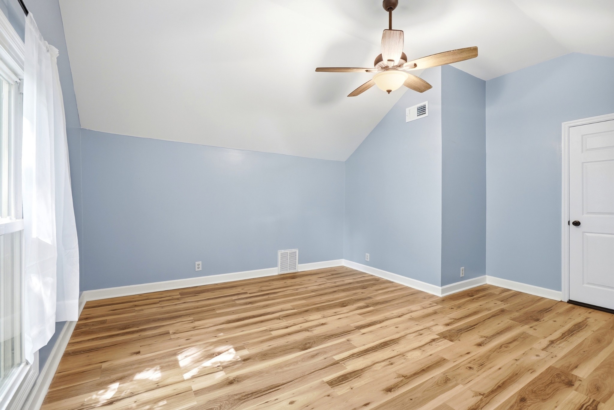 6471 Highway 161 Springfield, TN 37172 - Photo 38 of 57 a view of a room with wooden floor and fan