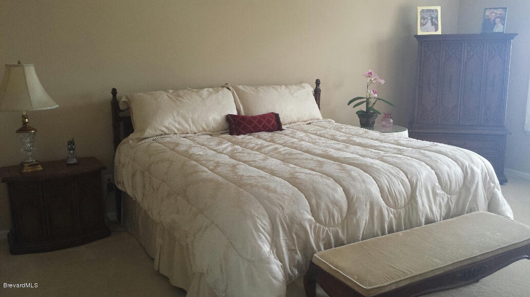 104 Riverside Drive, Unit 306 Cocoa, FL 32922 - Photo 14 of 27 Master bedroom