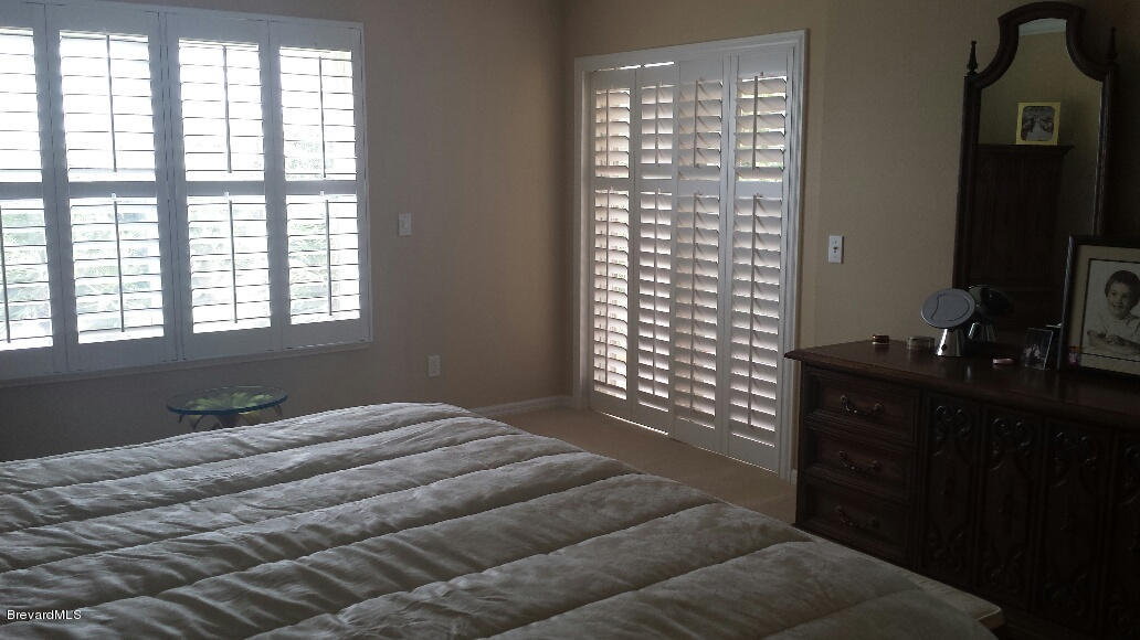 104 Riverside Drive, Unit 306 Cocoa, FL 32922 - Photo 16 of 27 Master bedroom