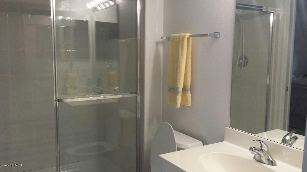 104 Riverside Drive, Unit 306 Cocoa, FL 32922 - Photo 19 of 27 Hall guest bathroom
