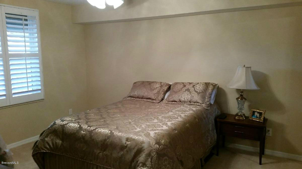 104 Riverside Drive, Unit 306 Cocoa, FL 32922 - Photo 20 of 27 Guest bedroom