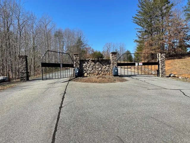 a view of a house with a snow on the road