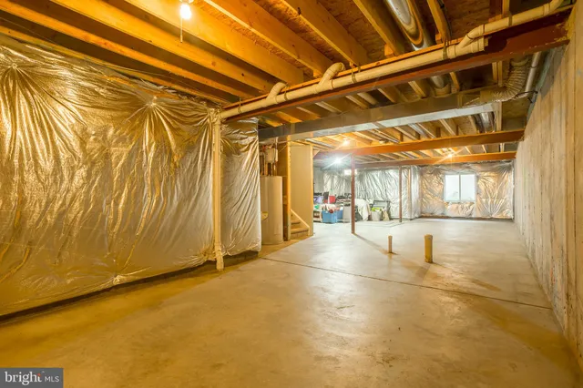 a view of a hallway with windows