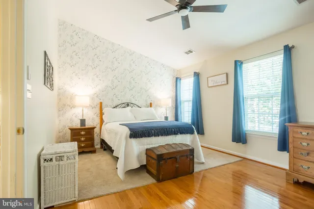 a bath tub sitting next to a shower