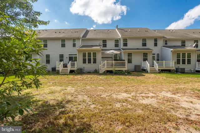 a front view of a house with a outdoor space