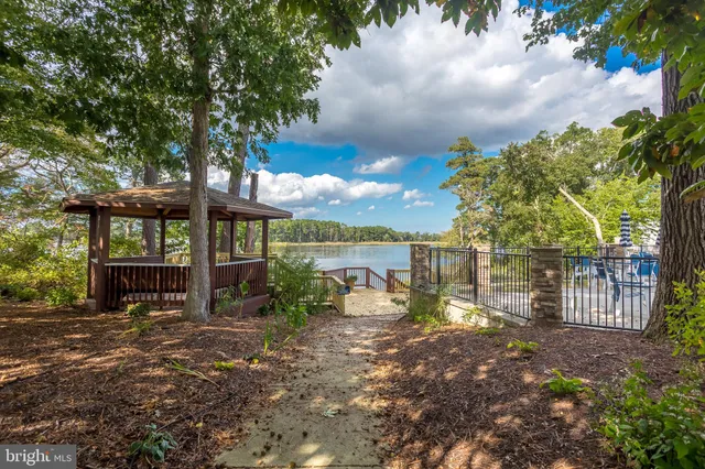 a view of a deck with a fence