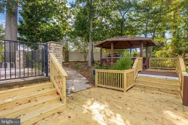 a view of a chair and table in the patio