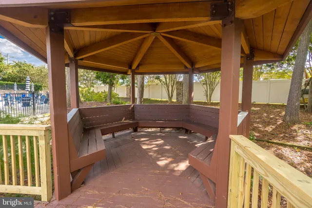 an aerial view of a house with swimming pool and outdoor space