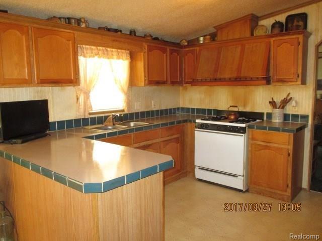 716 Goodrich Road Fostoria, MI 48435 - Photo 2 of 24 IMG_2598 (Small).JPG