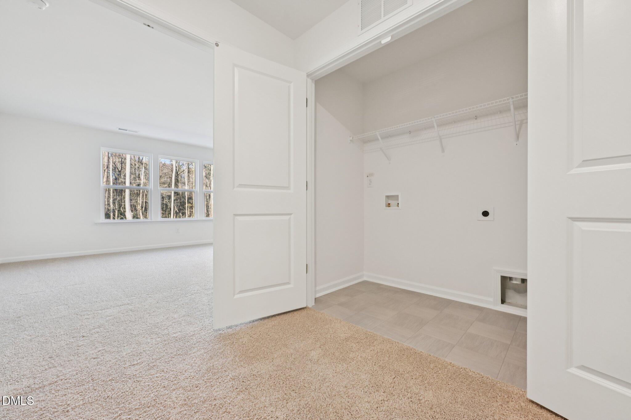 803 Old Tarboro Road Wendell, NC 27591 - Photo 21 of 48 a view of an empty room with a window