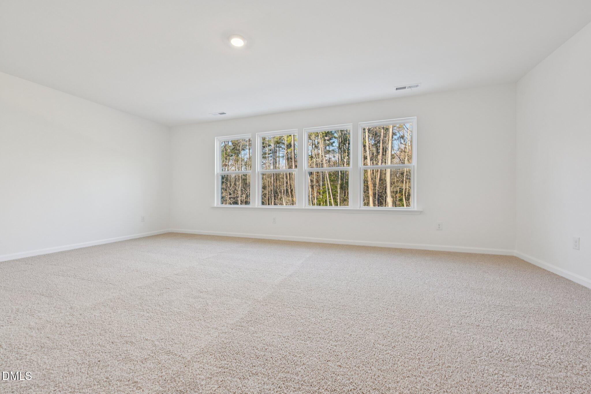 803 Old Tarboro Road Wendell, NC 27591 - Photo 26 of 48 an empty room with a window