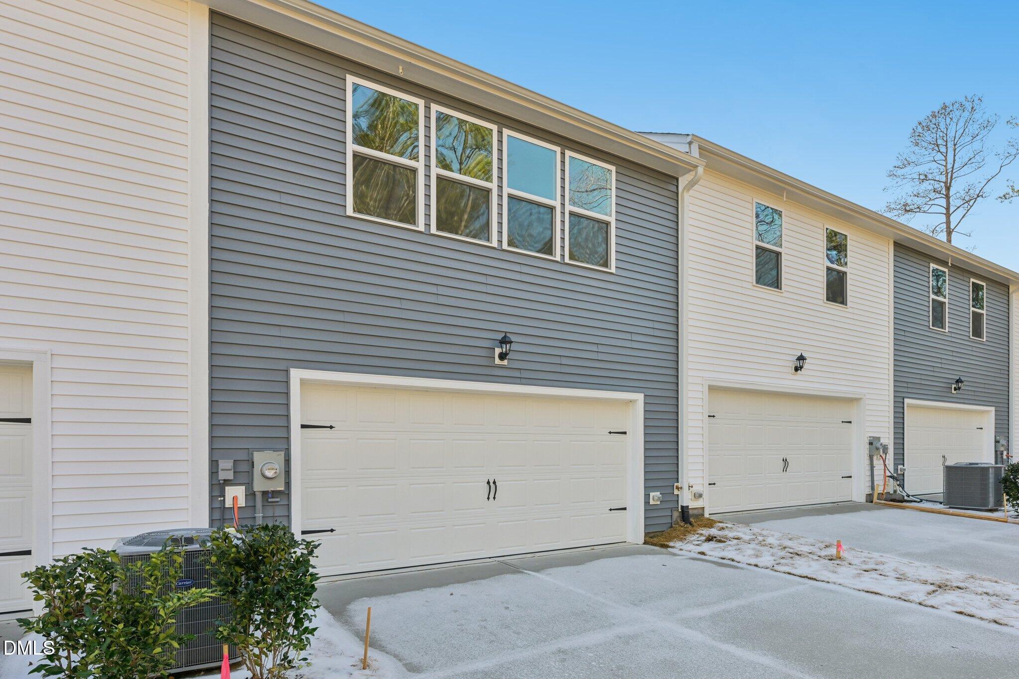 803 Old Tarboro Road Wendell, NC 27591 - Photo 30 of 48 a front view of a house with a garage
