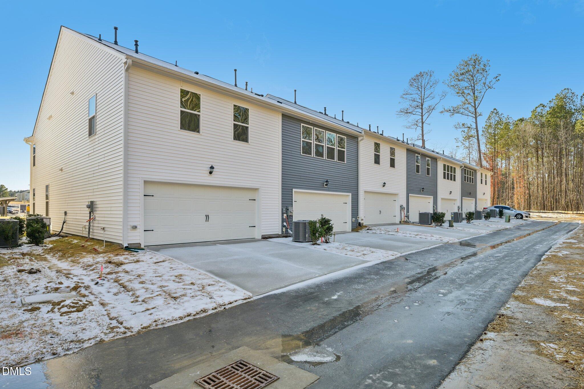 803 Old Tarboro Road Wendell, NC 27591 - Photo 34 of 48 a front view of a house with a yard