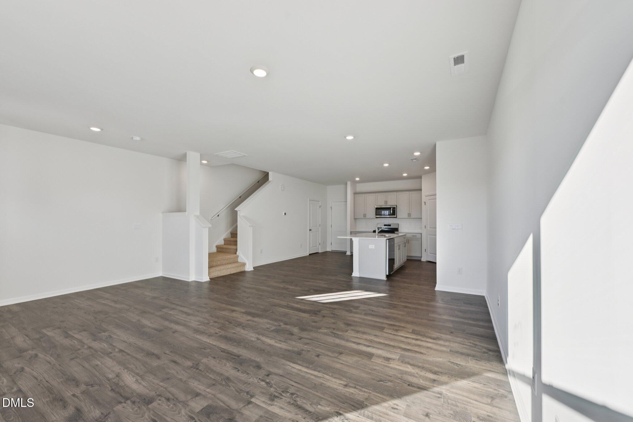 803 Old Tarboro Road Wendell, NC 27591 - Photo 8 of 48 a view of empty room with wooden floor