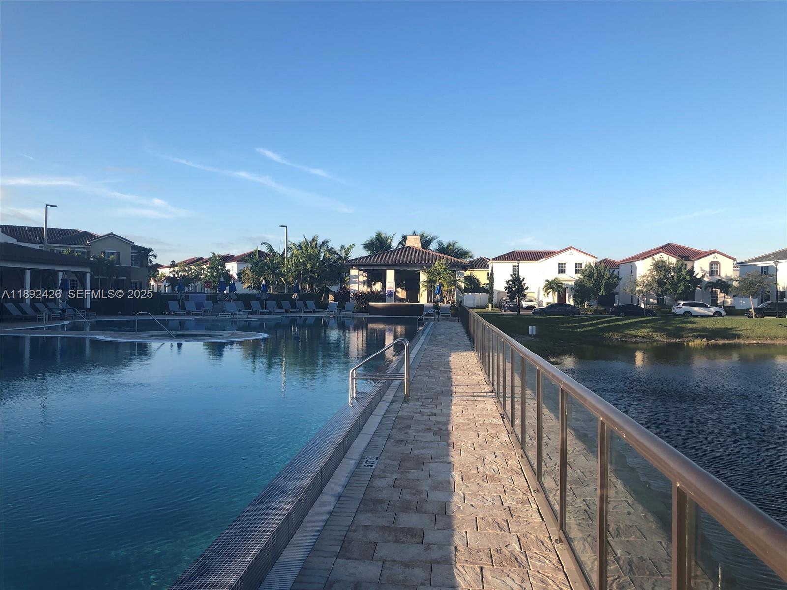 17105 Southwest 96th Street, Unit STUDIO Miami, FL 33196 - Photo 16 of 30 a view of a lake and outdoor space