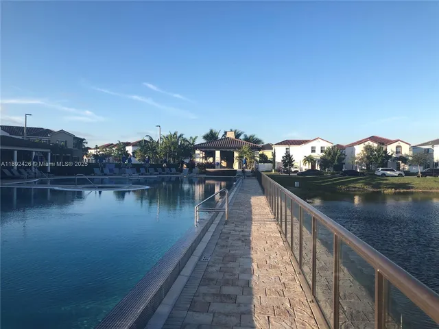 a view of outdoor sitting area with furniture and garden