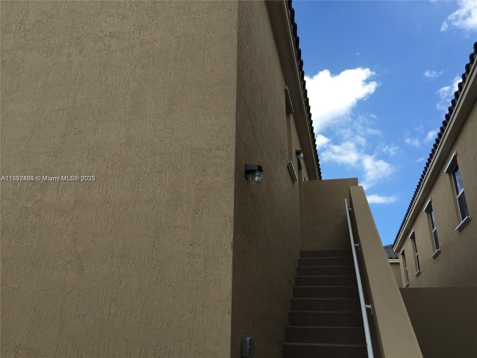 17105 Southwest 96th Street, Unit STUDIO Miami, FL 33196 - Photo 2 of 30 a view of an entryway