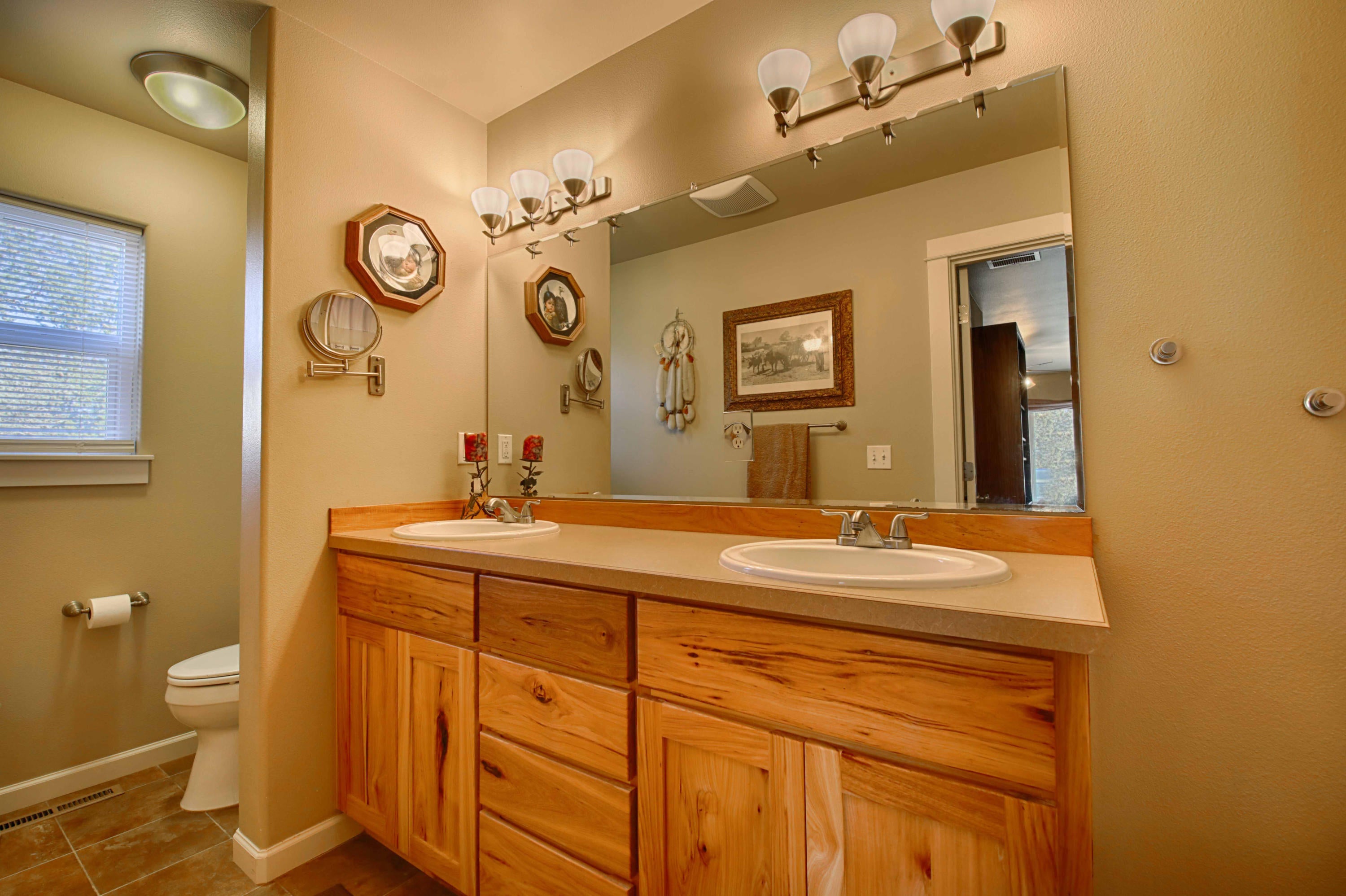 64818 Grande Loop Bend, OR 97701 - Photo 15 of 29 Master bathroom with double vanity sinks.