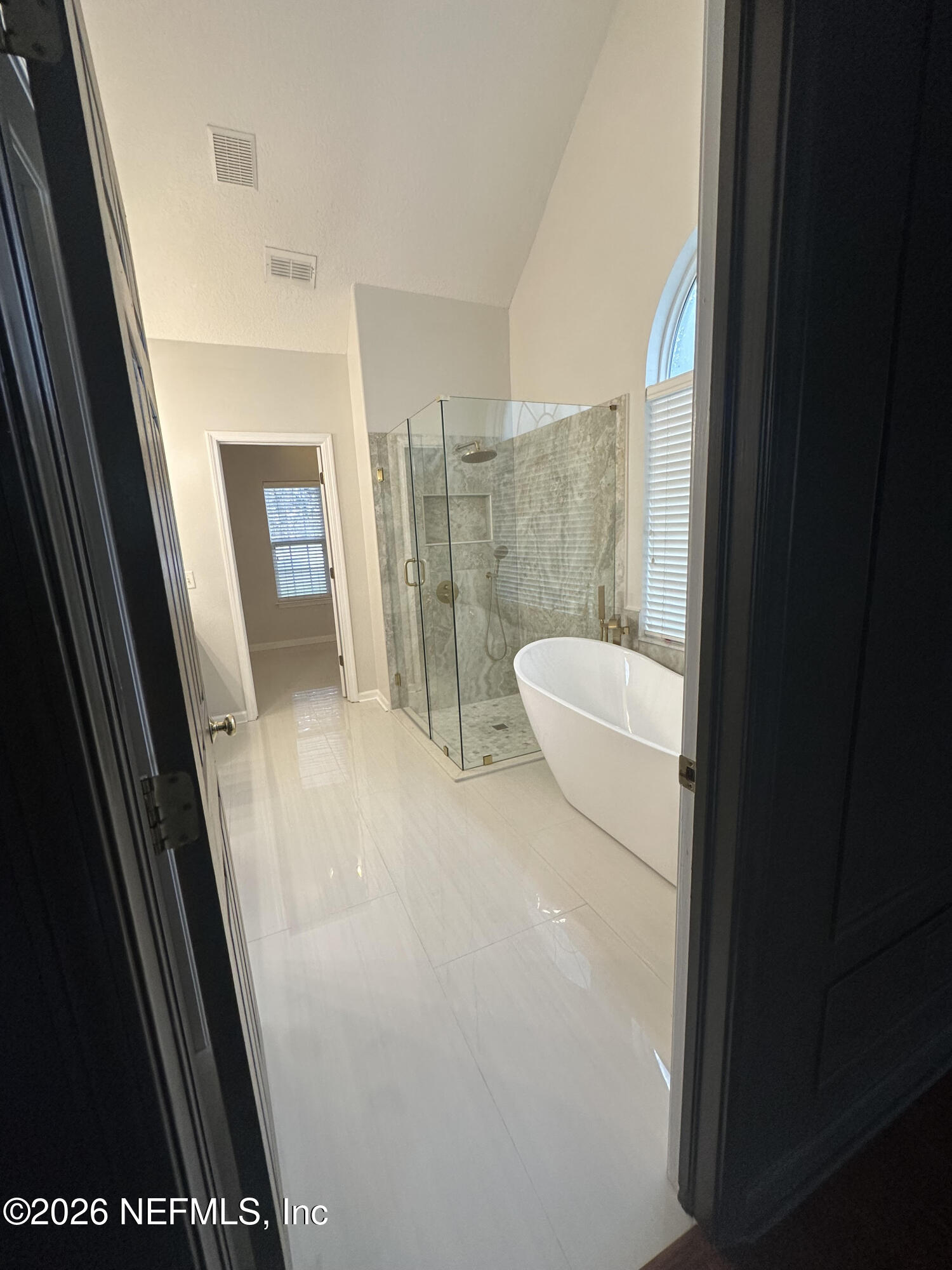 1024 Neptune Lane Neptune Beach, FL 32266 - Photo 33 of 60 a bathroom with a sink and mirror
