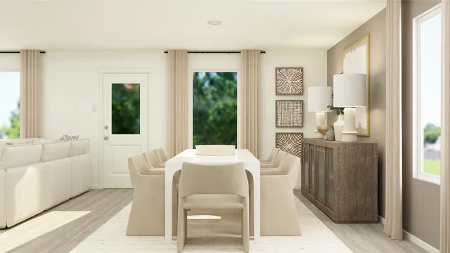 a dining room with furniture and large window