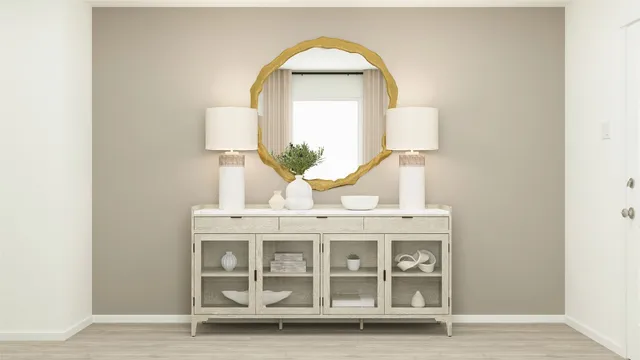 a view of living room with a mirror and window