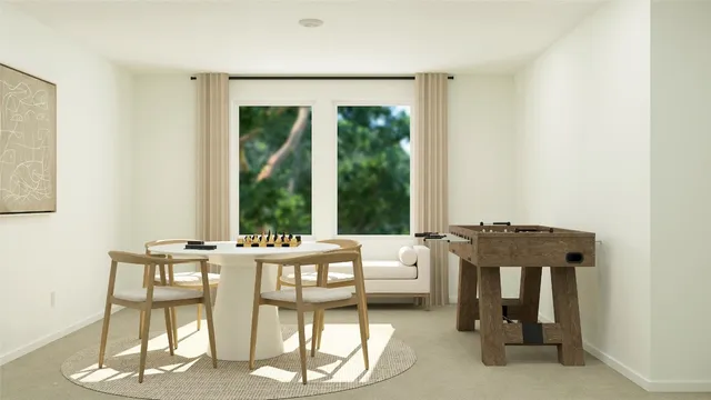 a view of a dining room with furniture window and outside view
