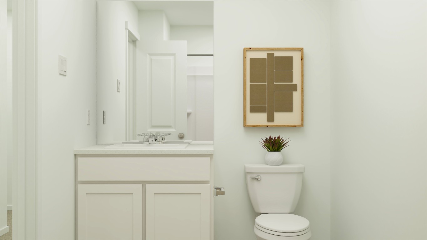270 Kings Row Lane Jarrell, TX 76537 - Photo 23 of 30 a bathroom with a sink a toilet and mirror