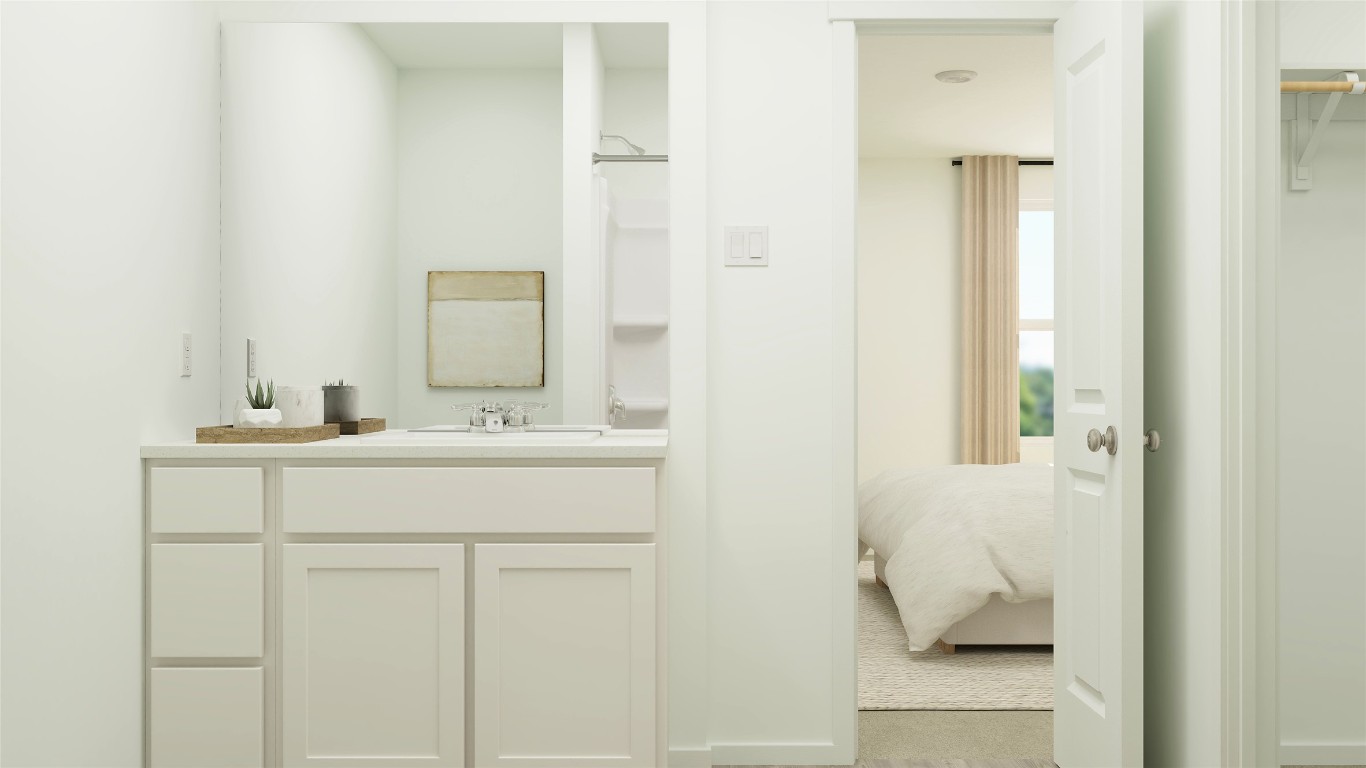 270 Kings Row Lane Jarrell, TX 76537 - Photo 26 of 30 a bathroom with a sink and a mirror