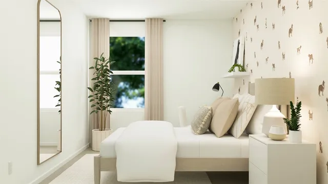 a bedroom with a bed and a potted plant