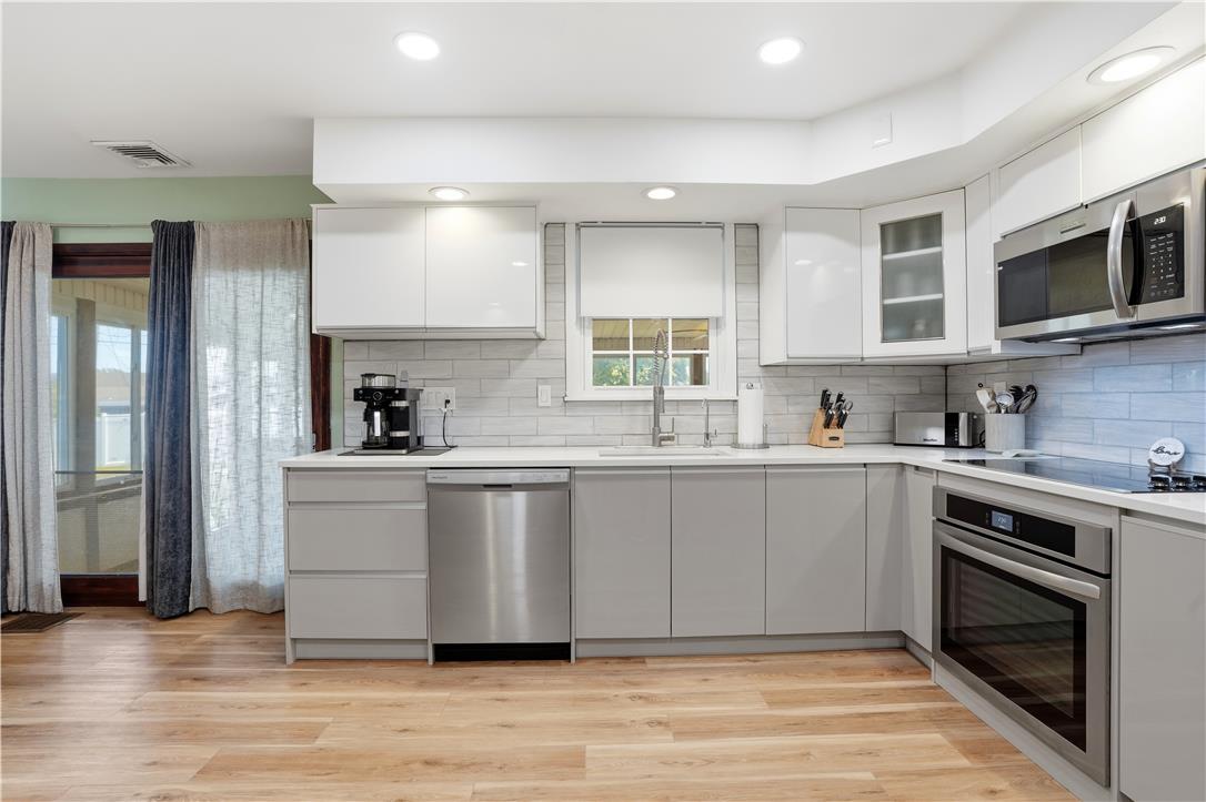 2918 Keystone Street Bethlehem, PA 18020 - Photo 10 of 54 A well-appointed kitchen features stainless steel appliances and abundant cabinetry, perfect for culinary adventures.