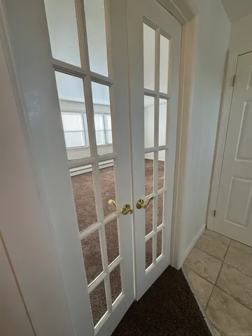 an empty room with windows