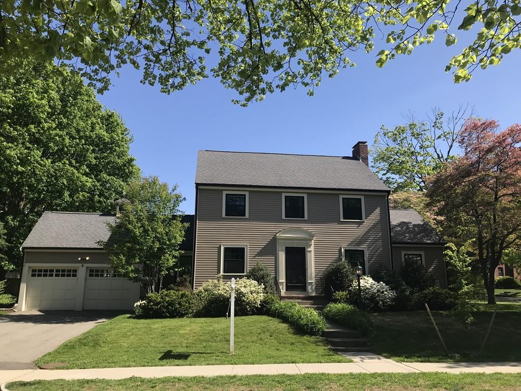 519 Brook Road Milton, MA 02186 - Photo 1 of 19 a front view of a house with a yard