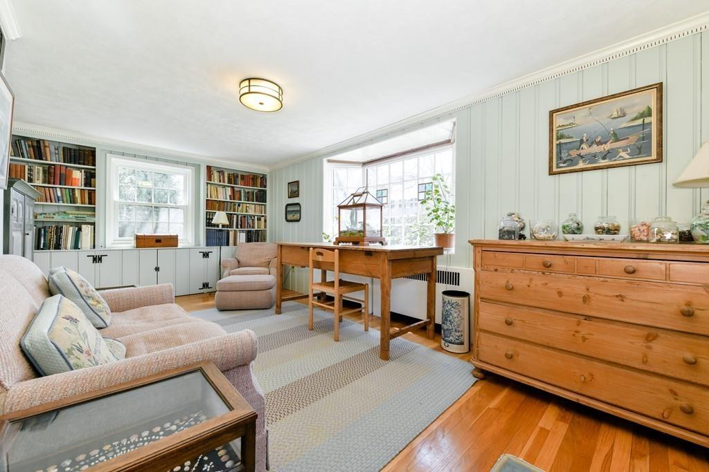 519 Brook Road Milton, MA 02186 - Photo 11 of 19 a living room with furniture and a large window