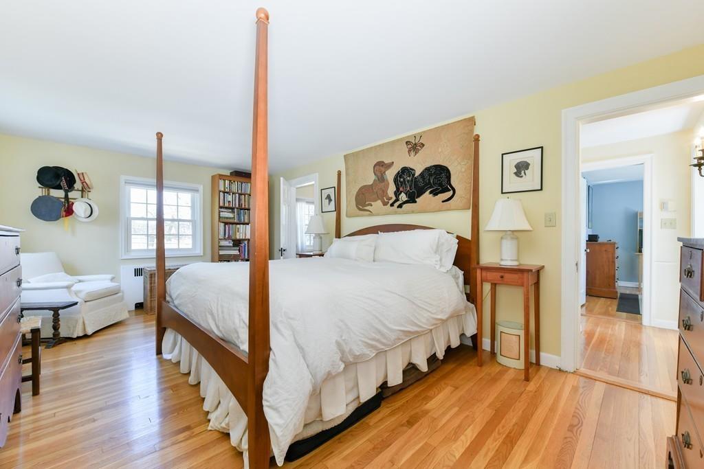 519 Brook Road Milton, MA 02186 - Photo 12 of 19 a bedroom with bed and wooden floor