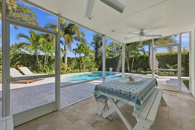 a outdoor space with the couches and dining table
