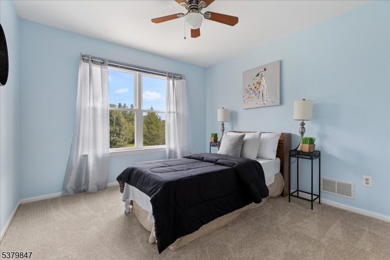 720 Colonial Court Somerville, NJ 08876 - Photo 17 of 33 a bedroom with a bed and window