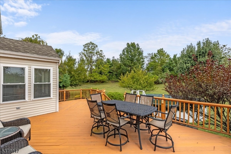 720 Colonial Court Somerville, NJ 08876 - Photo 23 of 33 a view of a patio with a table and chairs