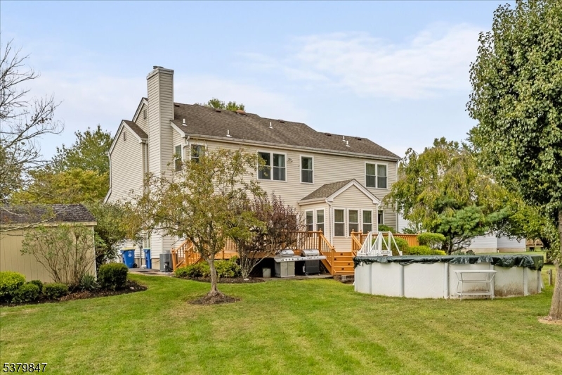 720 Colonial Court Somerville, NJ 08876 - Photo 28 of 33 a front view of a house with a yard