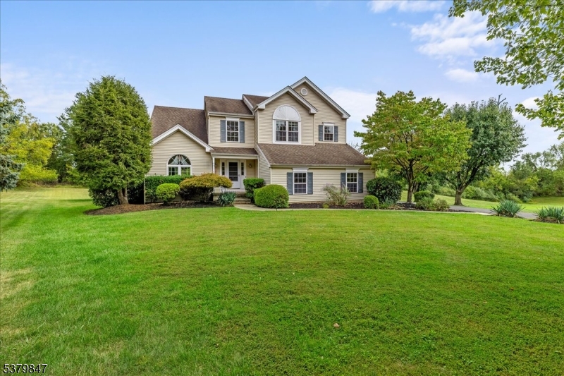 720 Colonial Court Somerville, NJ 08876 - Photo 29 of 33 a front view of a house with garden