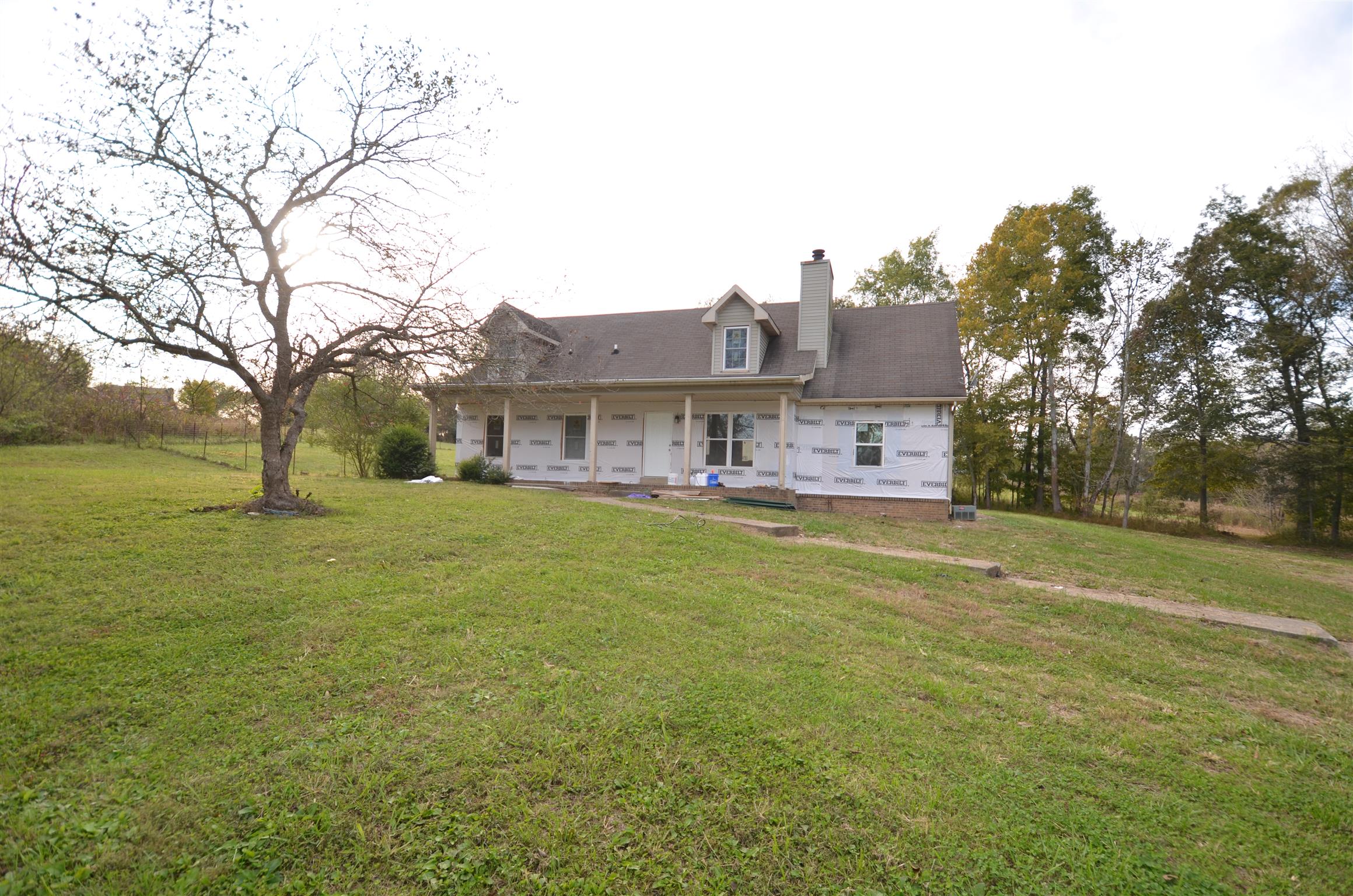 2301 Chester Harris Road Woodlawn, TN 37191 - Photo 1 of 14 Pick the color of vinyl siting for your home.
