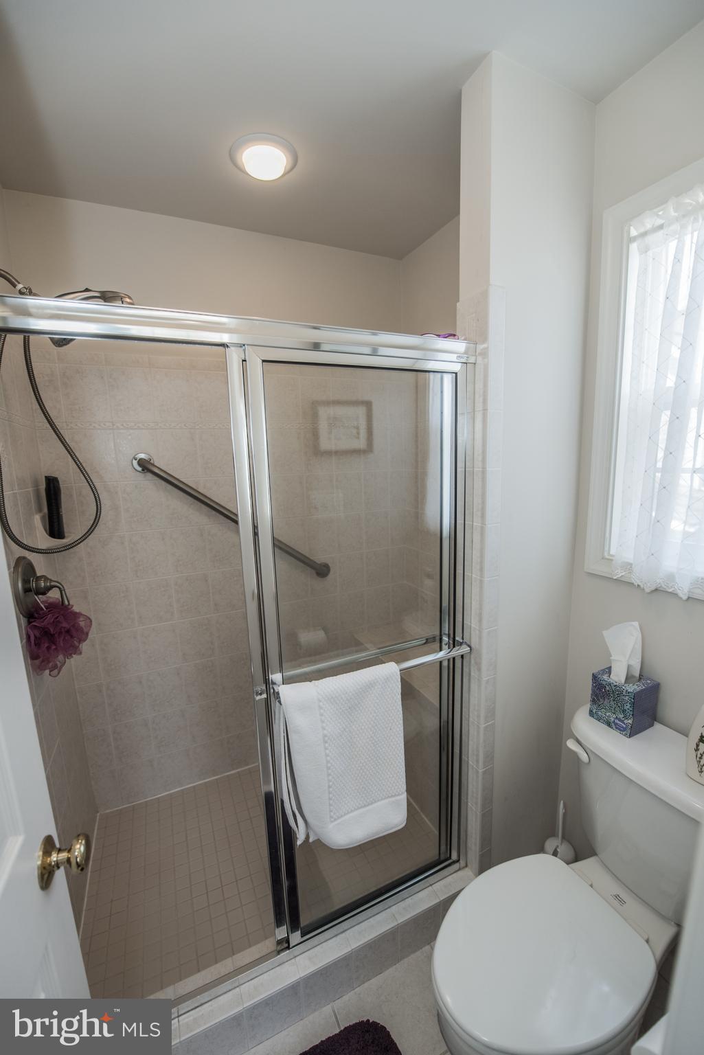108 Eagle Drive Cross Junction, VA 22625 - Photo 12 of 39 a bathroom with a toilet and a shower
